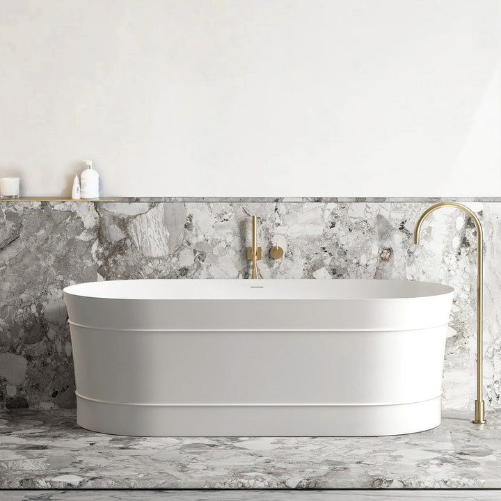 Attica Bondi 1500 Gloss White Bath - freestanding bath styled in a grey stone bathroom with brushed gold tapware