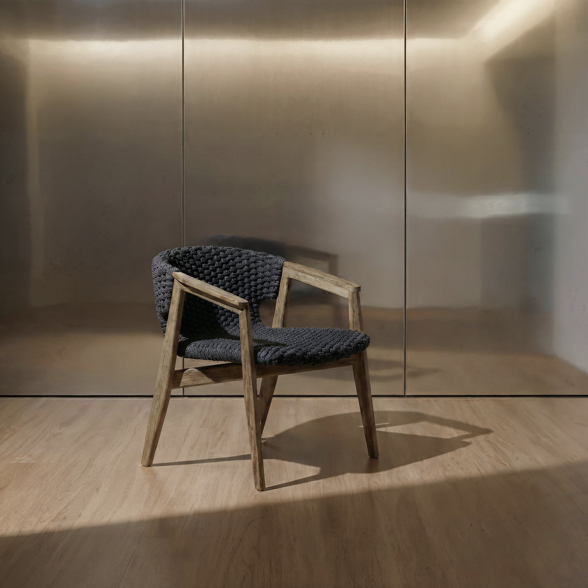 Dekton Kedar on a floor with a single chair