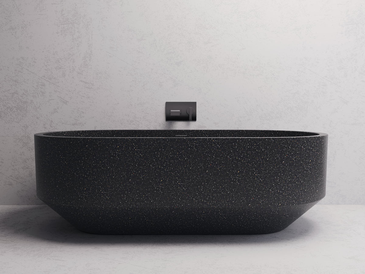 Eden Oval freestanding bath — Black terrazzo lifestyle