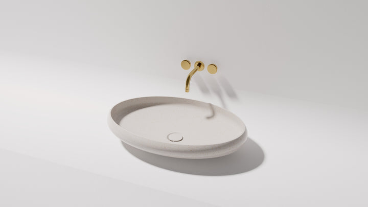 Piero above counter basin, side view