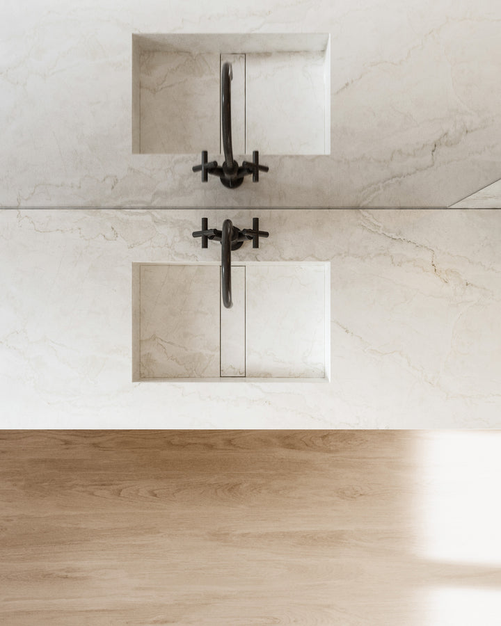 Dekton Kedar in a bathroom with Dekton Evok and Thala, overhead view