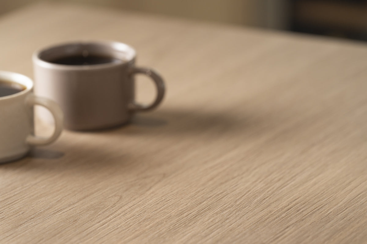 Dekton Kedar on a surface close-up with coffee cups
