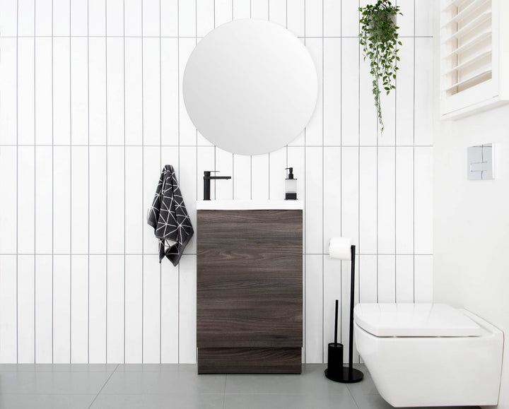 Petite Vanity, Petite 550, Floor Mount. Bottega Oak Woodmatt textured cabinet finish