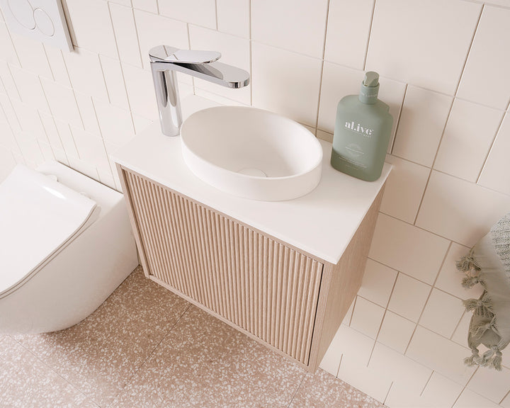 Clifton Mini Wall Hung Vanity - Clifton Mini Coastal Oak Woodmatt textured cabinet finish, 12mm Bright White Cherry Pie benchtop. Matte White Joy Basin (included), Chrome Liberty Basin Mixer (sold separately)