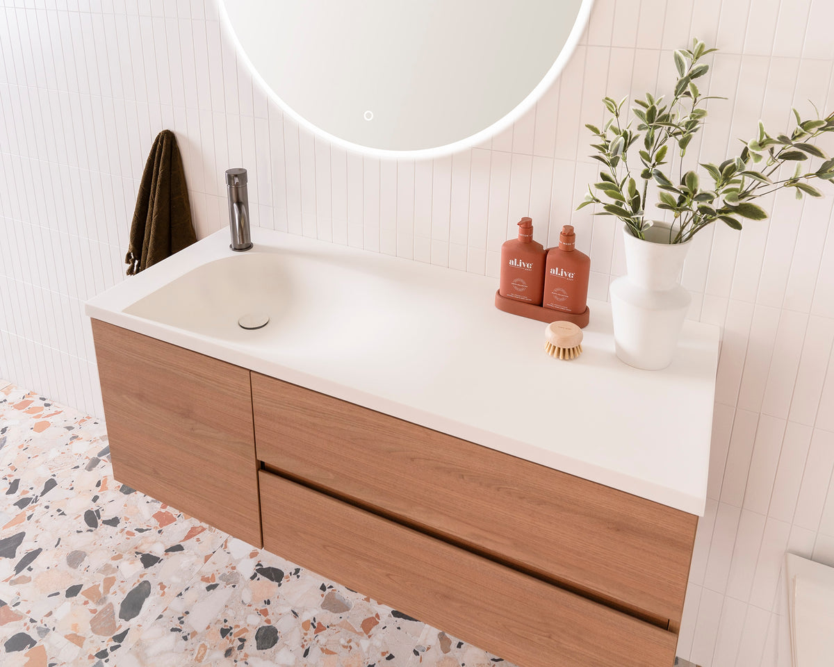 Drift Wall Hung Vanity - Drift 1200 Left Hand Offset Bowl. Tasmanian Oak Woodmatt textured cabinet finish, Solid Surface Top