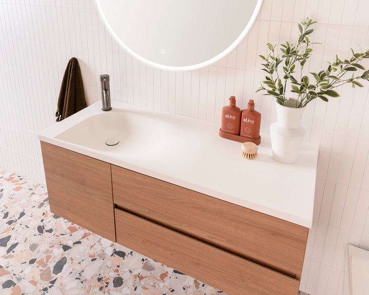 Drift Wall Hung Vanity - Drift 1200 Left Hand Offset Bowl. Tasmanian Oak Woodmatt textured cabinet finish, Solid Surface Top