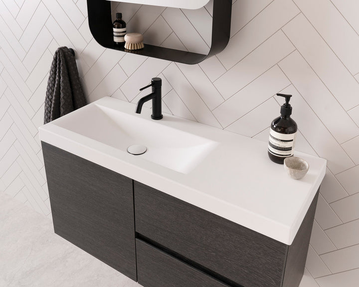 Drift Ensuite Wall Hung Vanity, Drift 900 Left Hand Offset Bowl. Estella Oak textured cabinet finish, Solid Surface Top