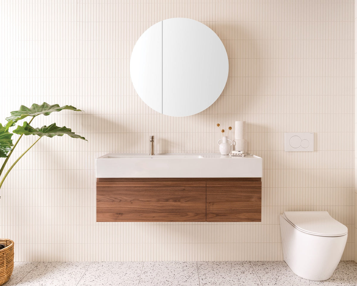 Capri Wall Hung Vanity - Capri 1200 Left Offset Bowl, Notaio Walnut cabinet finish Round Mirrored Cabinet