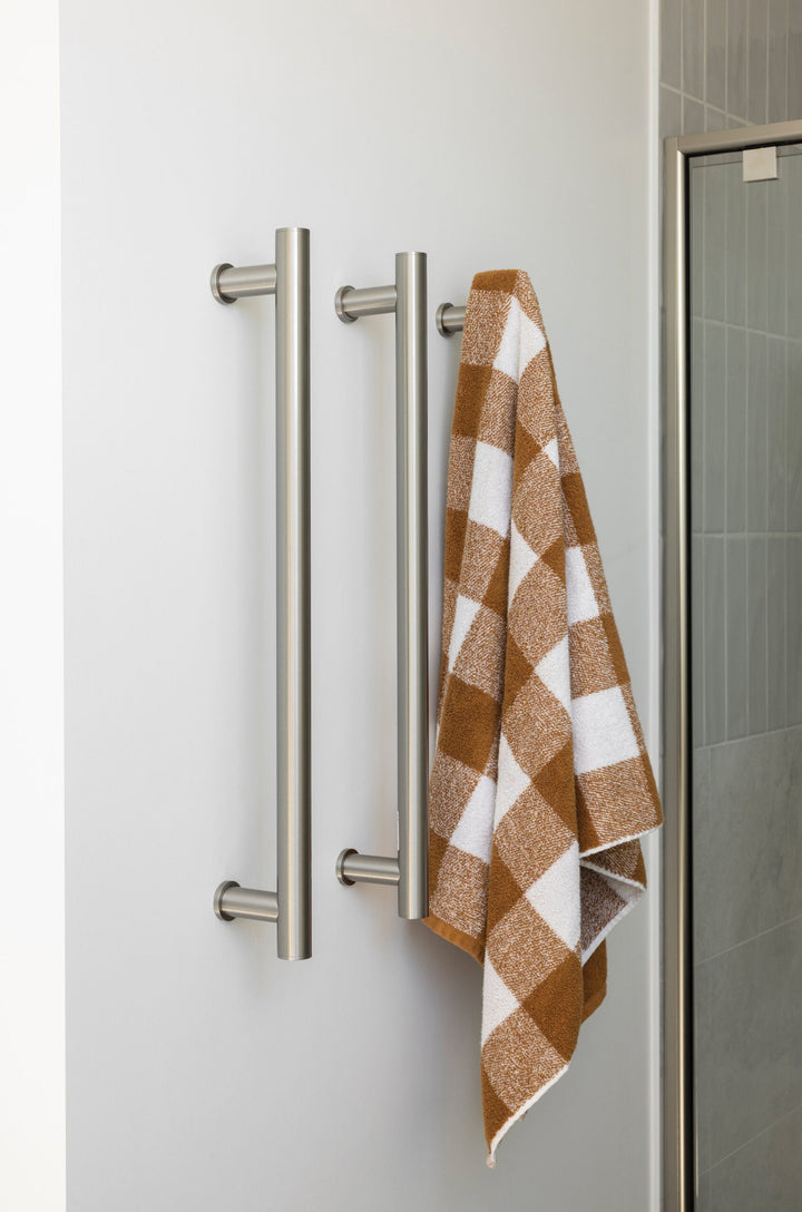 Heated Triple Towel Rail Round 600mm lifestyle