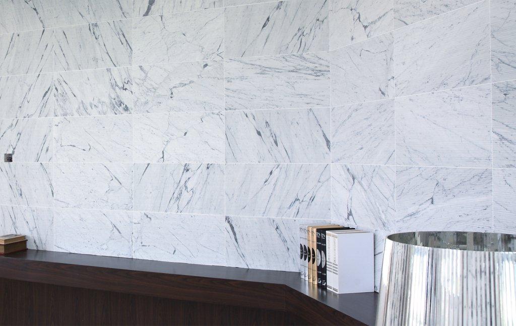 Stream Carrara Marble Tile installed